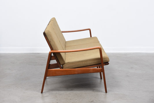 New upholstery included: 1960s Danish teak sofa