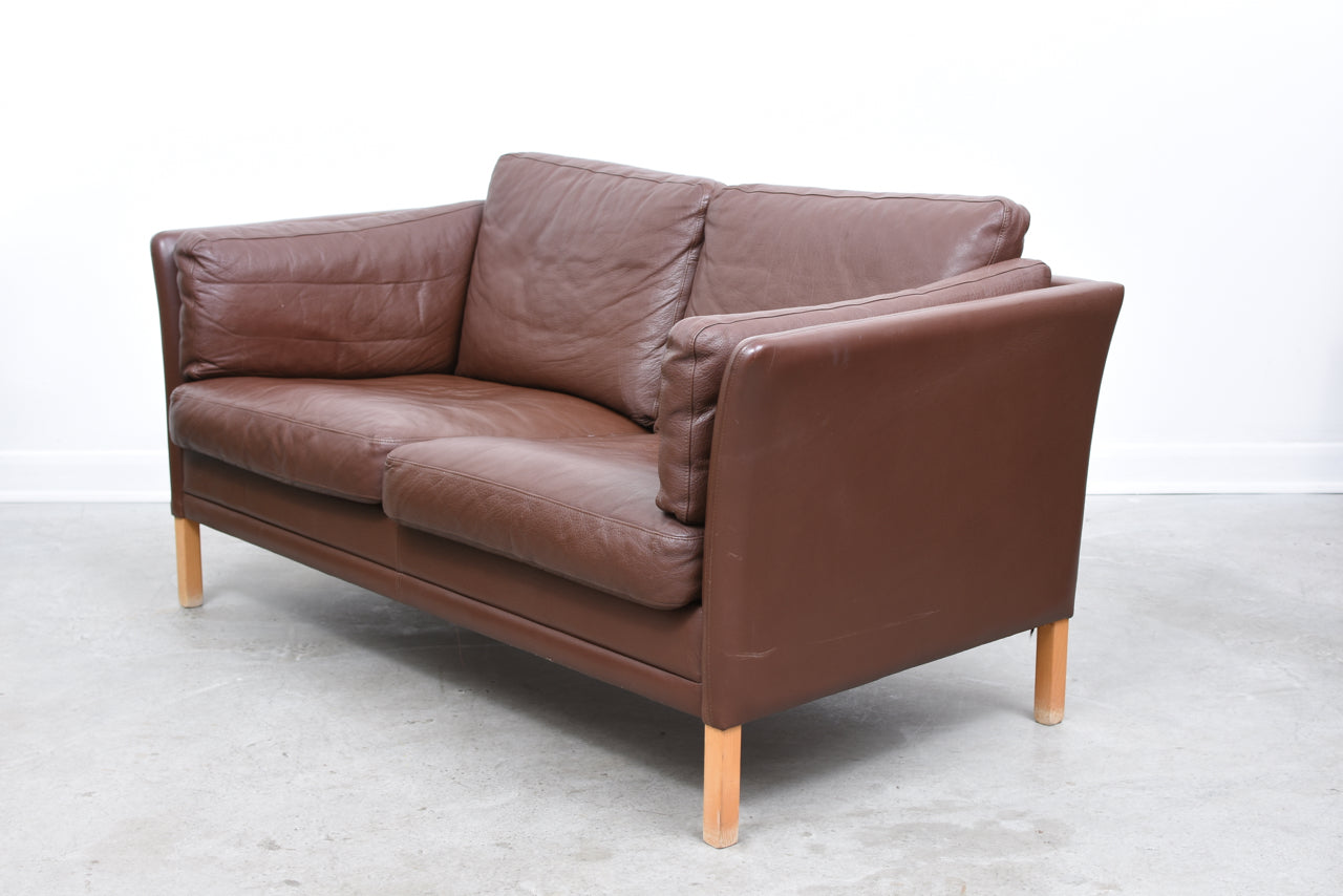 Two seat leather sofa by Mogens Hansen