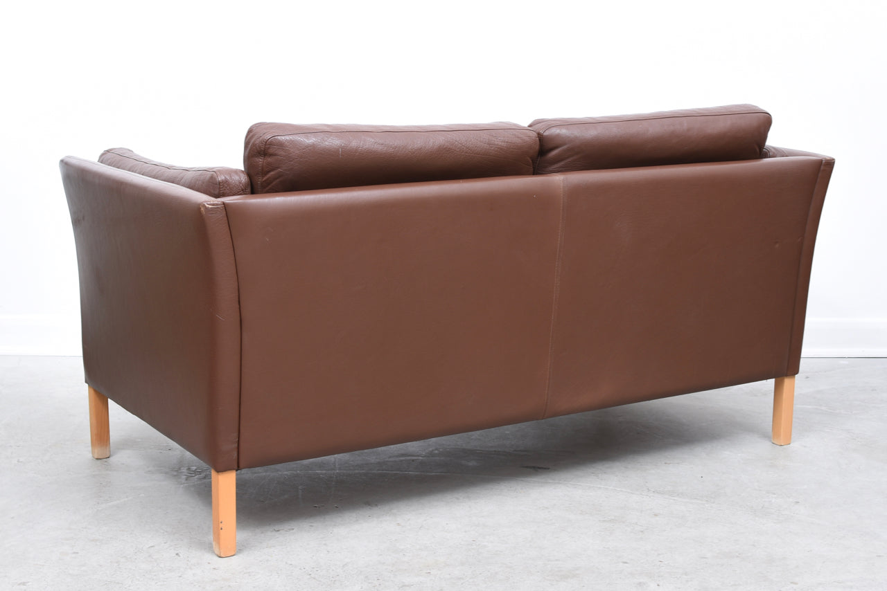 Two seat leather sofa by Mogens Hansen