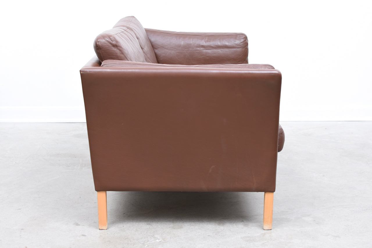 Two seat leather sofa by Mogens Hansen