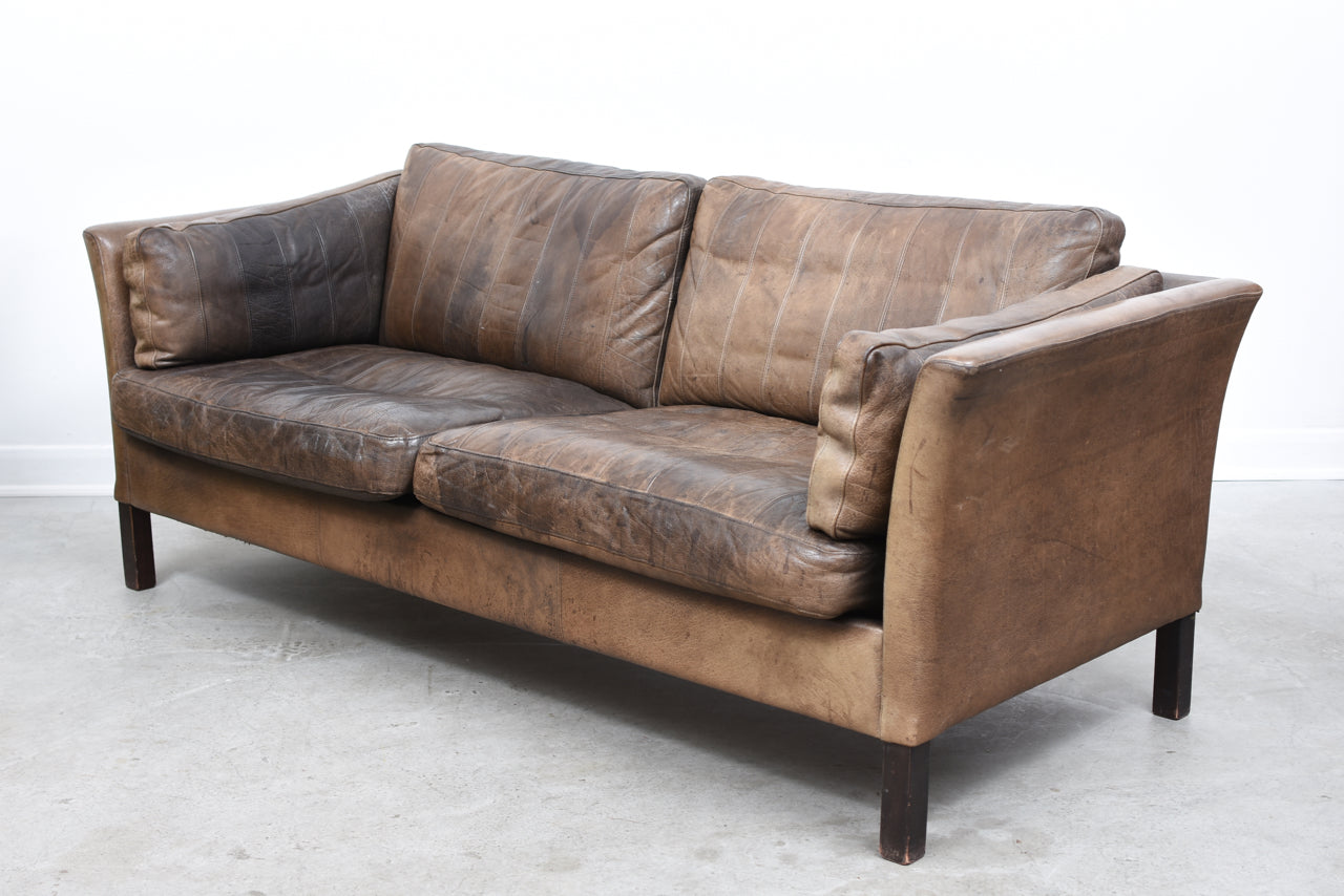 Two and a half seat leather sofa by Mogens Hansen