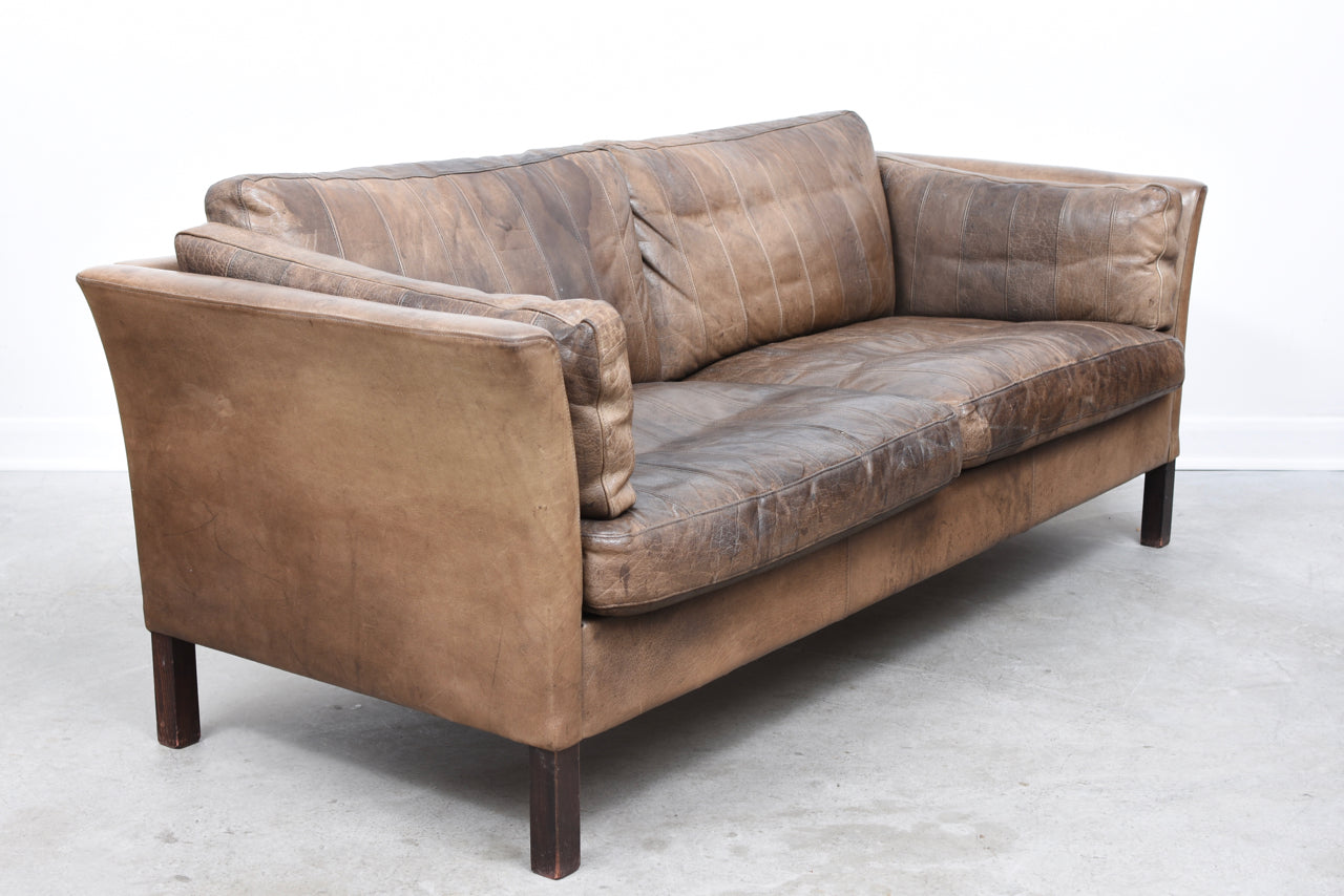 Two and a half seat leather sofa by Mogens Hansen