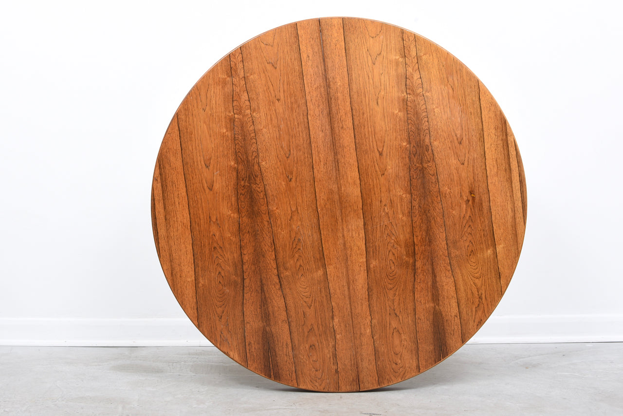 Extending rosewood dining table by Kai Kristiansen