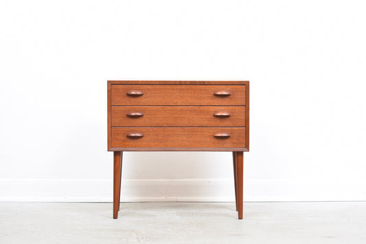 Low teak chest of drawers
