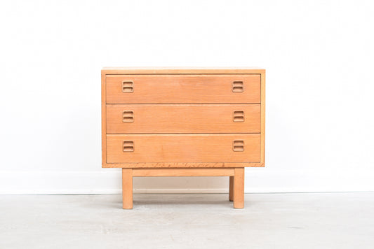 Low oak chest of drawers