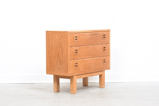 Low oak chest of drawers