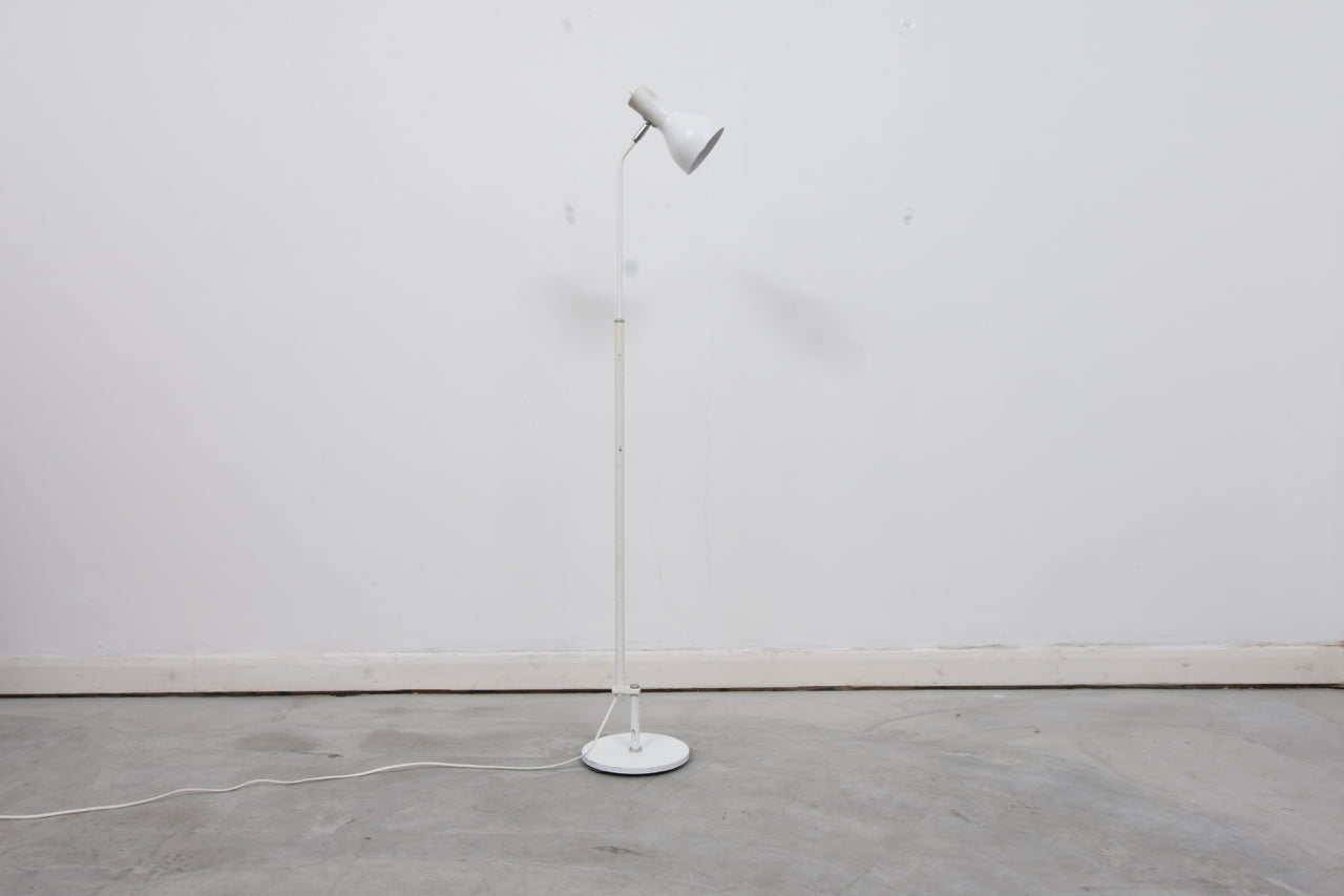 White floor lamp with chrome detail