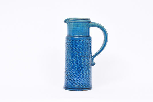 Turquoise ceramic pitcher by Kähler